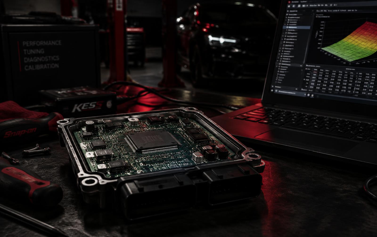 ECU circuit board on a diagnostics bench